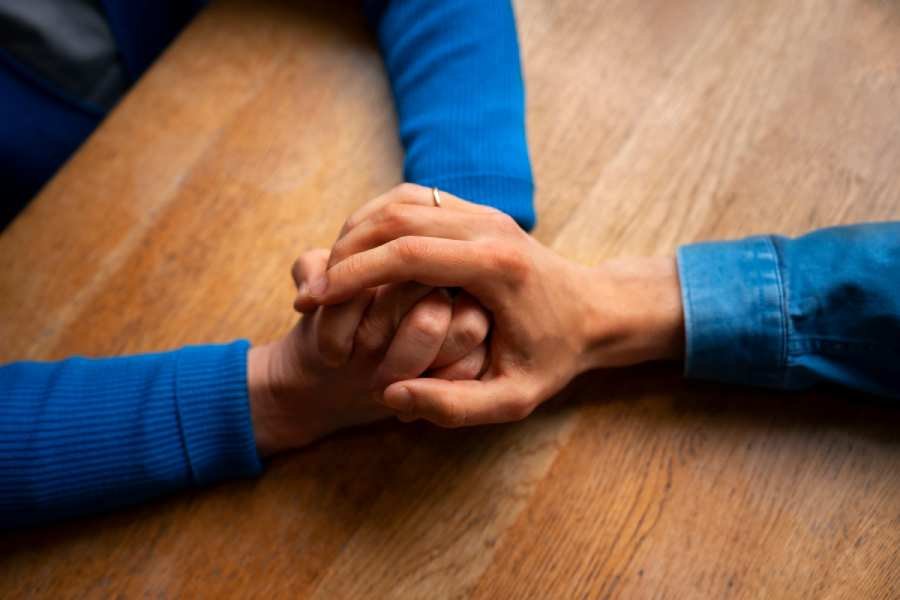 hands-holding-each-other-support